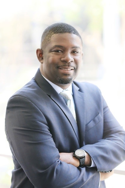 Headshot of a man in a business suit