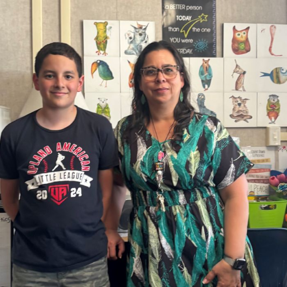 Lorena Guerrero with sixth grade student.